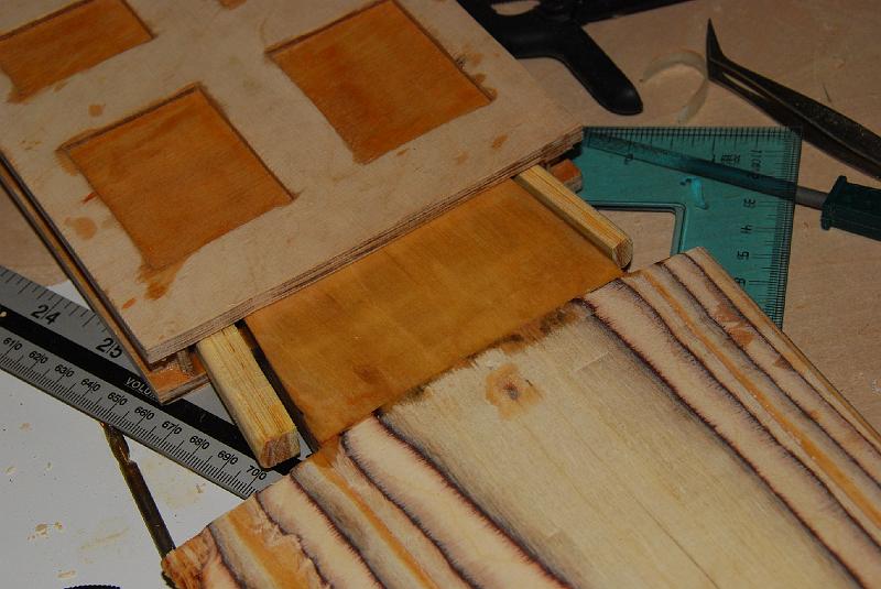 DSC_0010.JPG - with the keel pulled slightly out of the keel box the inserts that position the keel for and aft. these allow the keel a total of about 20mm for and aft movement.